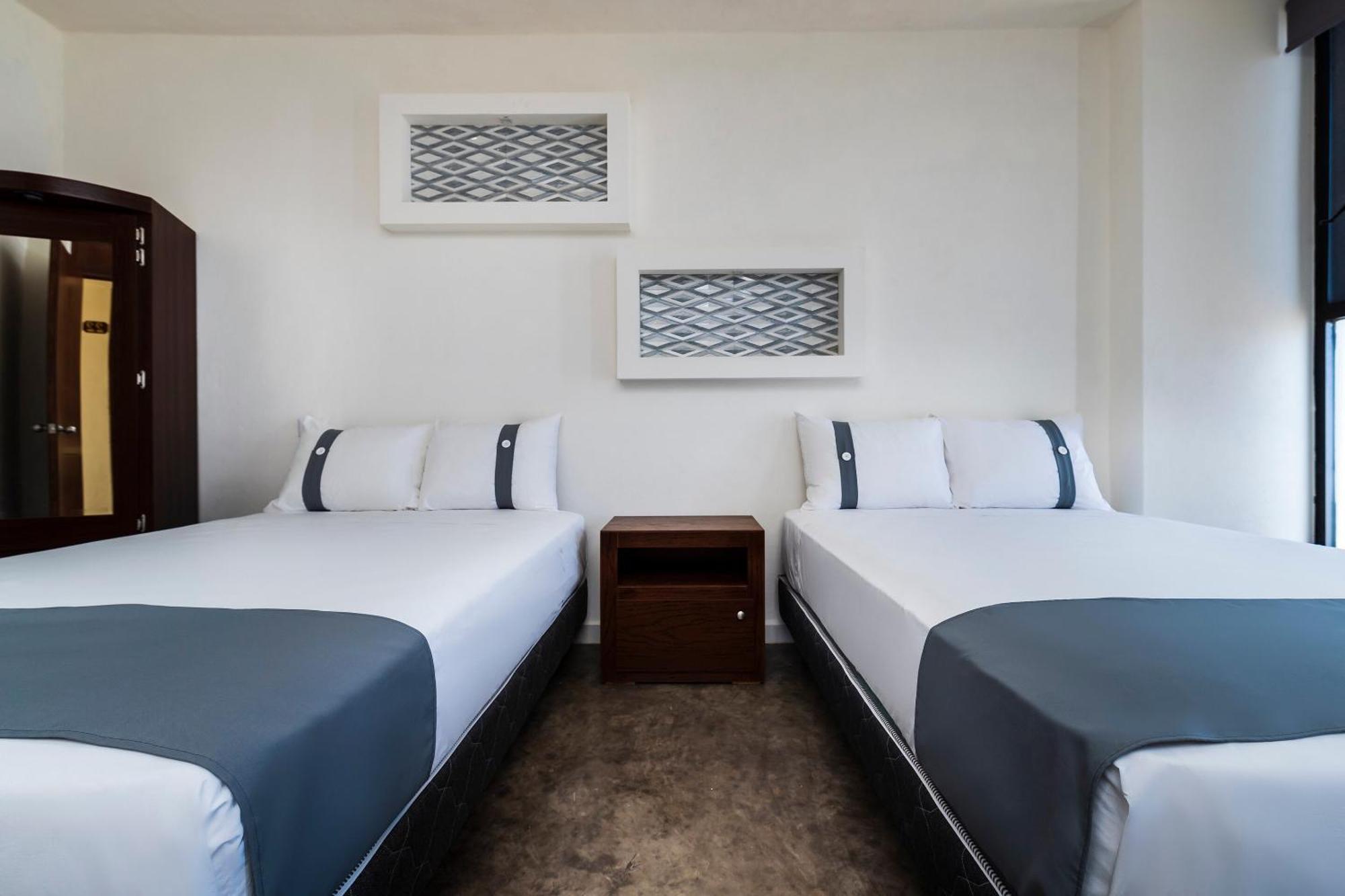 Capital O Hotel Joyma Suites, San Luis 圣路易斯波托西 外观 照片